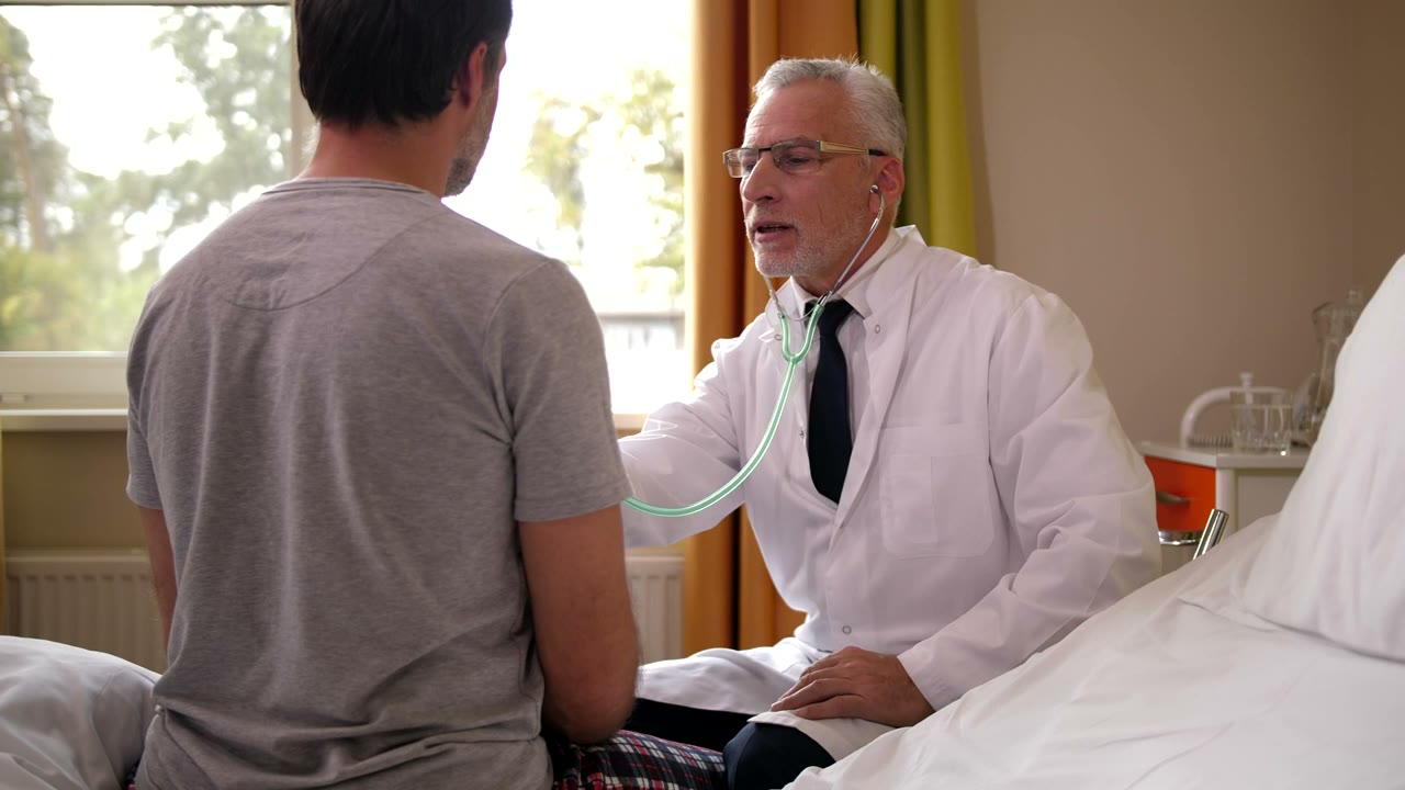 Physician examining a patient in a clinic